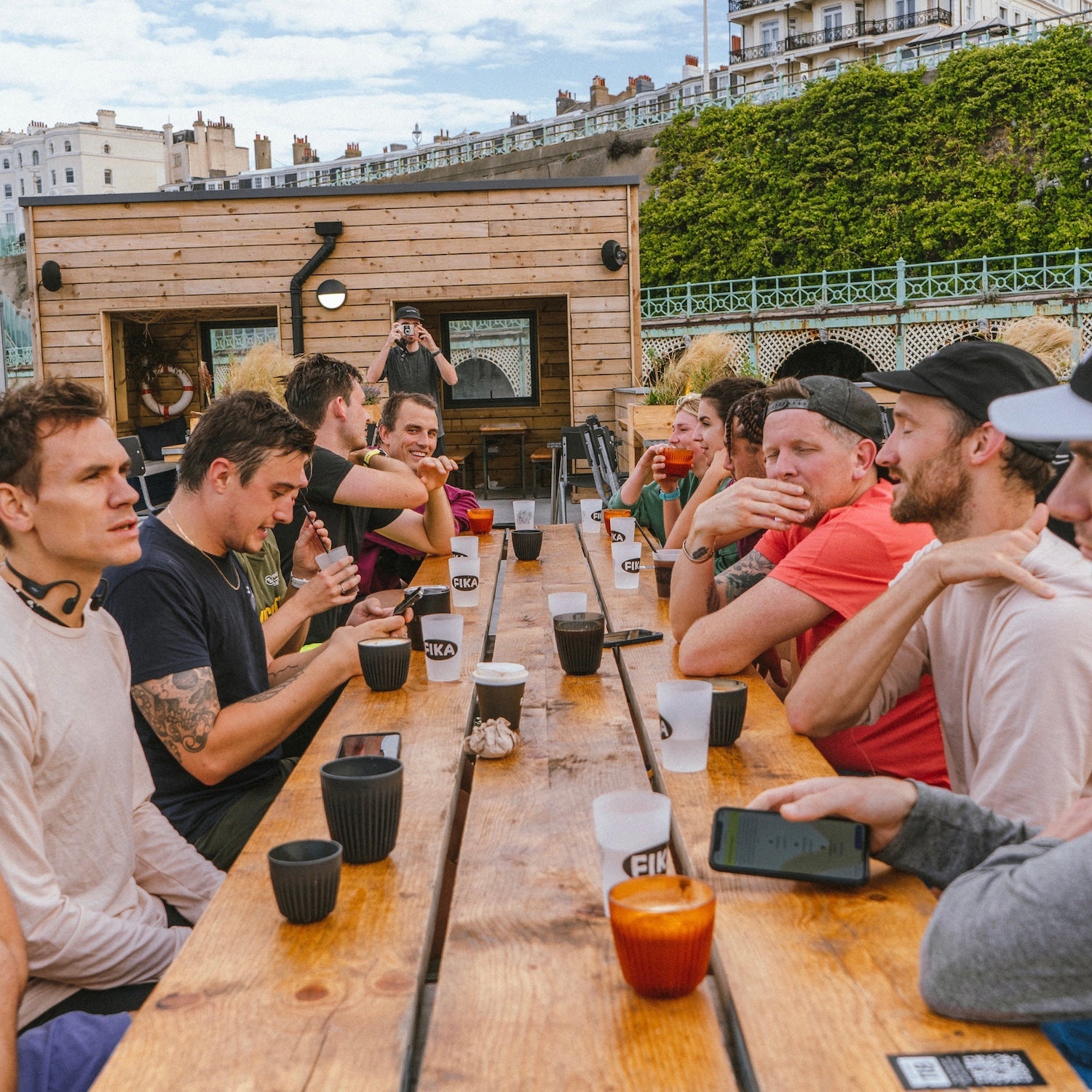 Runners drinking coffee after the Angry Pablo Social Run Club in Brighton