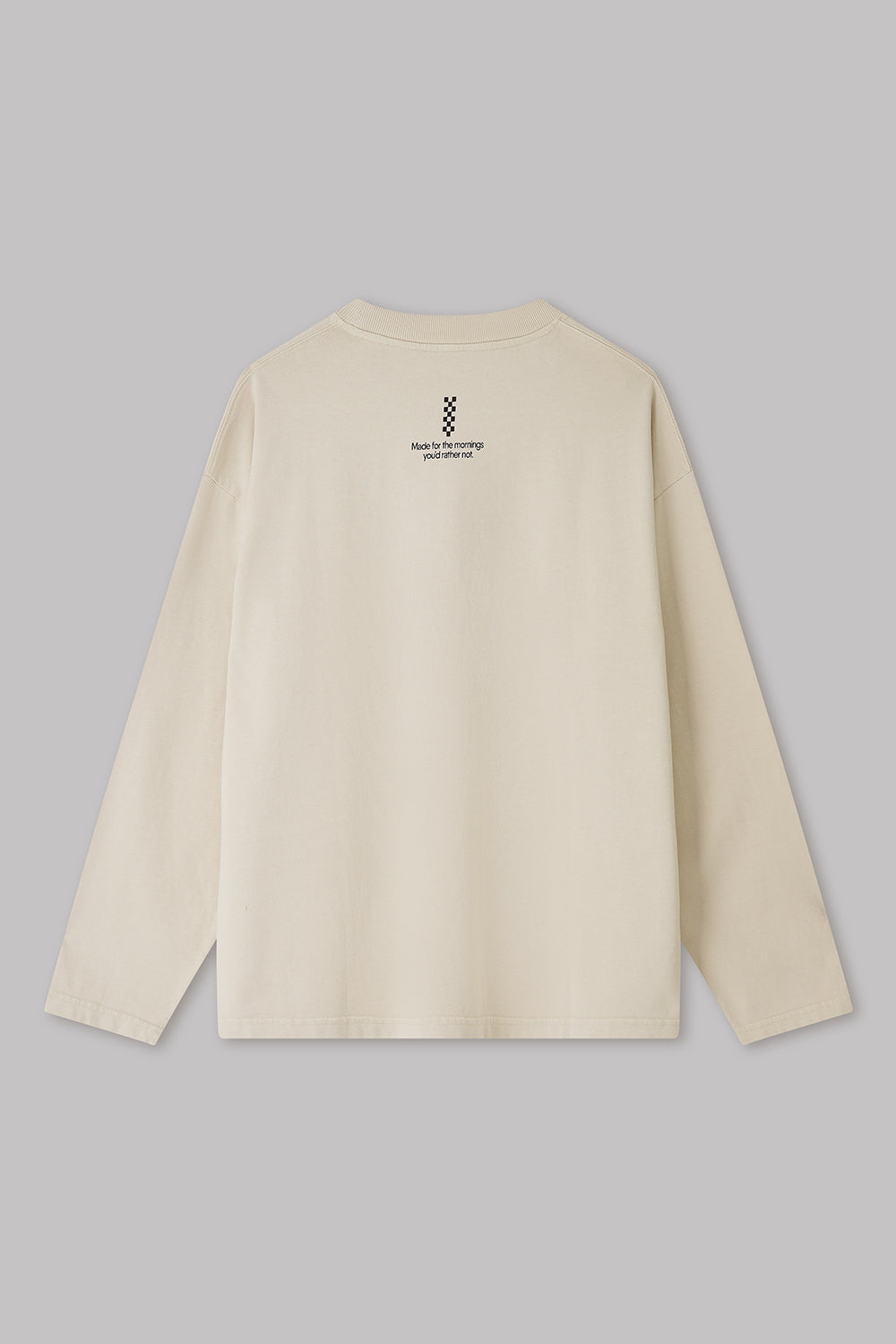 Beige long-sleeve shirt on a gray background