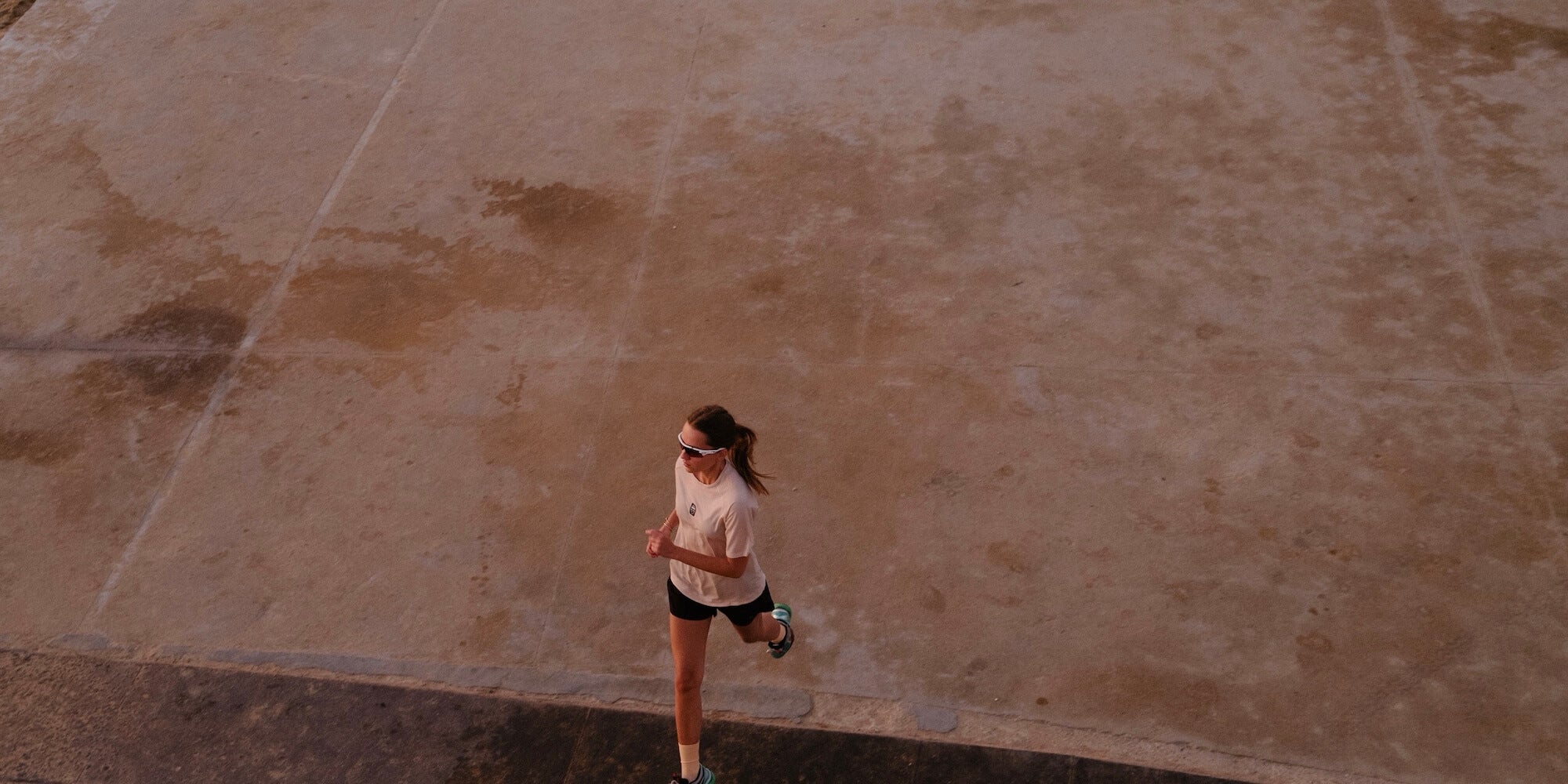A female runner wearing Angry Pablo lightweight running kit