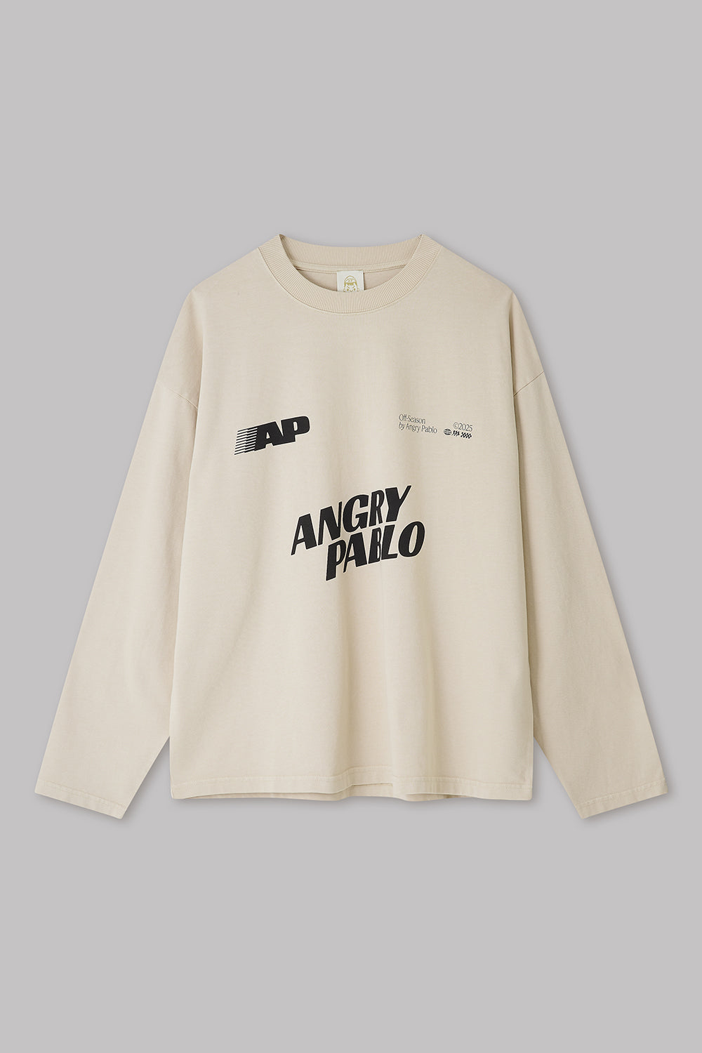 Beige long-sleeve shirt with 'ANGRY PAULO' text on a gray background
