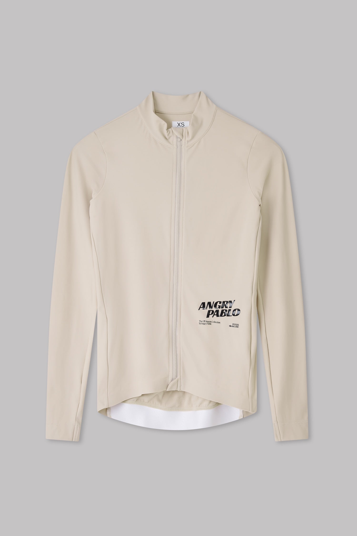 Beige long-sleeve shirt with a brand logo on a gray background